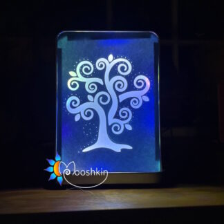 Lantin featuring a swirly tree, with coloured lights inside