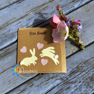 Handmade die cut 'new baby' card featuring baby bunnies and hearts on a kraft card measuring 10x10cm