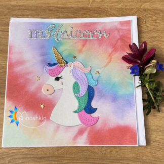 Handmade greetings card: be a unicorn. A die cut unicorn with multi-coloured mane, backed by rainbow tie die paper, featuring the message 'be a unicorn'.
