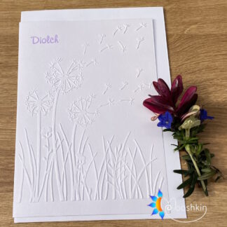 Handmade greetings card - embossed dandelion seed heads on white card, with the word 'diolch' (Welsh for 'thank you) heat embossed in lilac