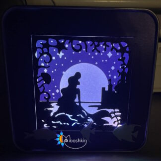 Mooshkin Lantin - light-up scenes in tins - featuring a mermaid on rocks overlooking the sea