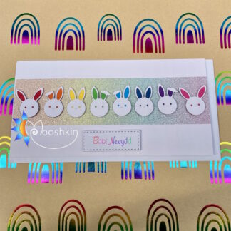 Handmade die cut greetings card - a rainbow of rabbits to welcome a new baby