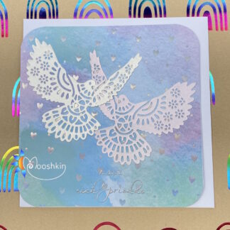 Handmade die cut greetings card featuring die cut doves on a multicoloured background