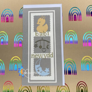Handmade die cut greetings card featuring a duck, a mobile and a moon and star to welcome a new baby