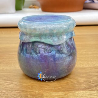 Handmade resin jar in a 'mermaid' colour scheme of aqua, blue, pink and purple
