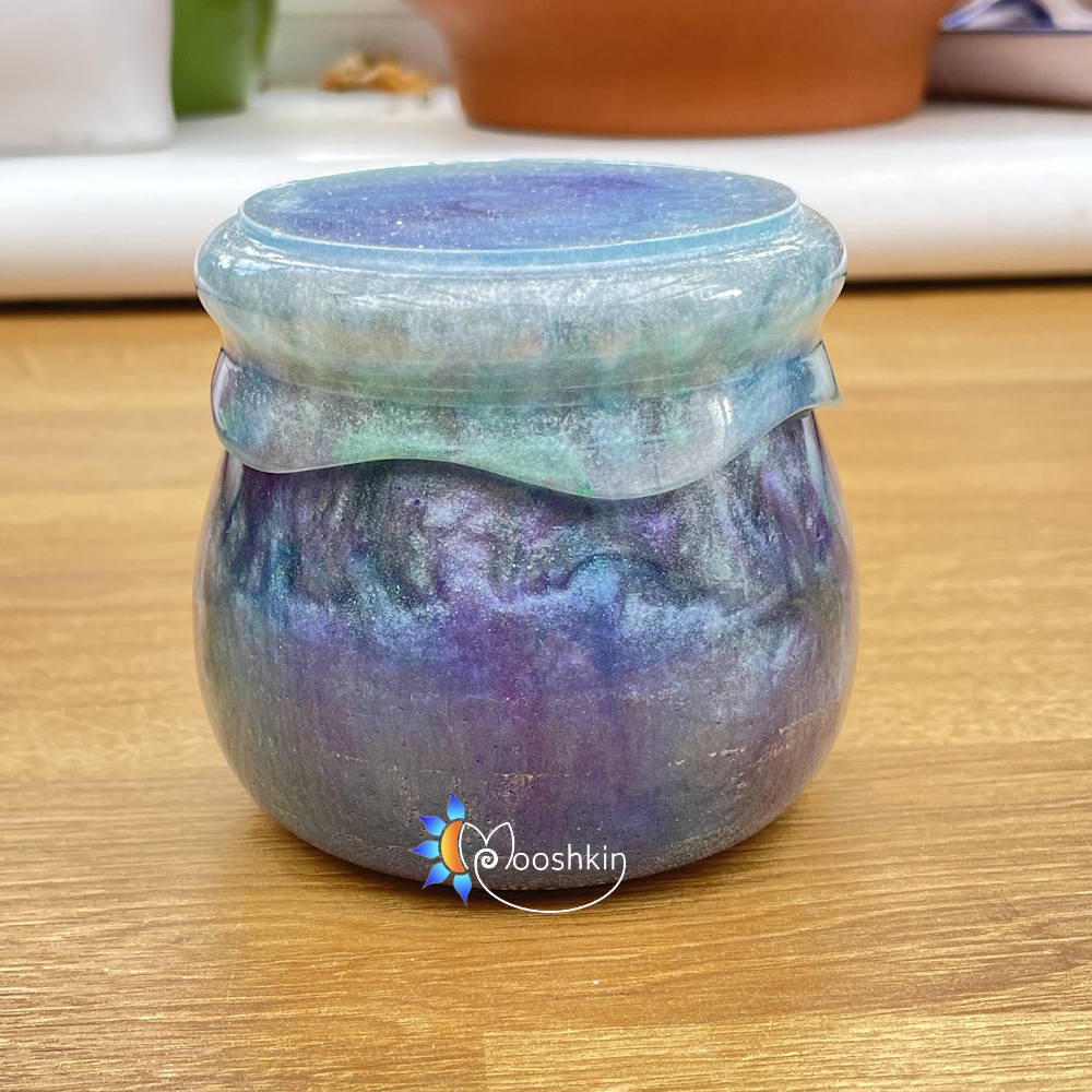 Handmade resin jar in a 'mermaid' colour scheme of aqua, blue, pink and purple
