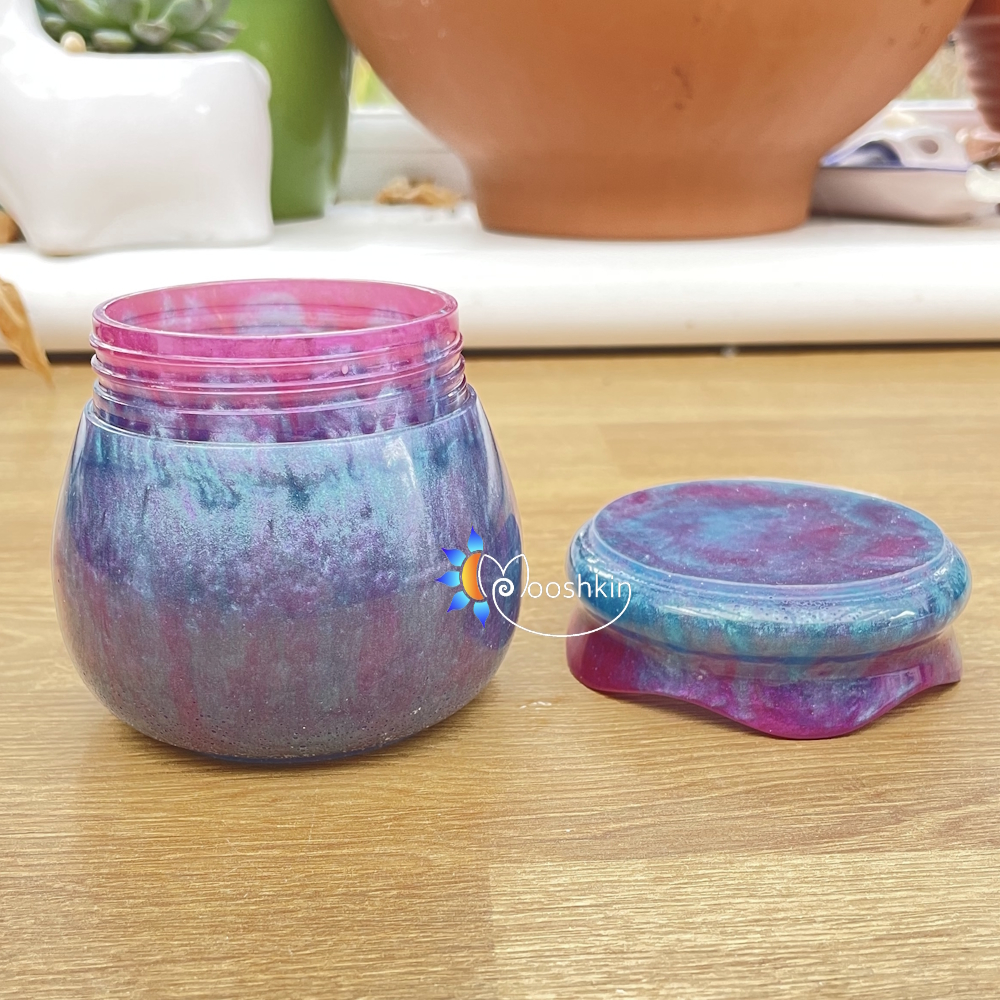 Handmade resin jar in 'jewel' colour scheme of bright pink, blue and purple