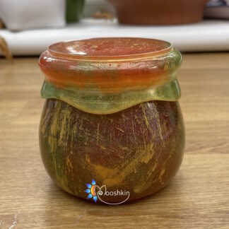 Handmade resin screw-top jar in red, gold and green
