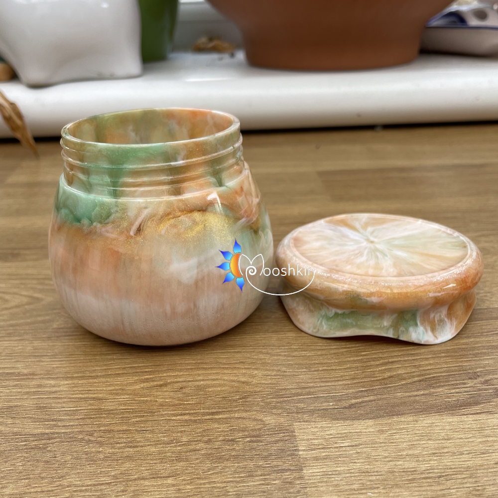 Handmade resin jar in tangerine, gold, white and green colour scheme